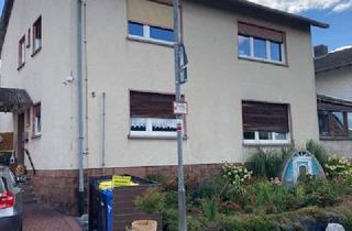Einfamilienhaus kaufen in Auf Der Scheubahn, 35091 Cölbe, Geräumiges Einfamilienhaus mit 2 getrennten Wohnungen