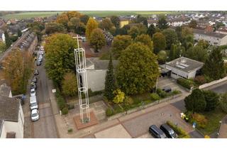 Grundstück zu kaufen in An Der Gnadenkirche, 52499 Baesweiler, Geteiltes Eckgrundstück, bebaut mit einer leerstehenden Kirche und einem Einfamilienhaus (Abriss)!