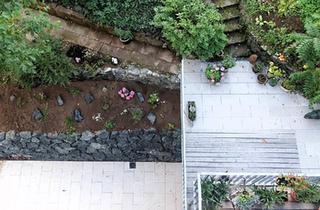 Wohnung kaufen in 35606 Solms, Solms - 2 Gartenwohnungen an großem Hof, Erstbezug