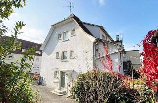 Mehrfamilienhaus kaufen in 78224 Singen, Singen (Hohentwiel) - Mehrfamilienhaus - Erdgeschosswohnung wird frei - 2 Wohnungen vermietet mit Garage und Grundstück