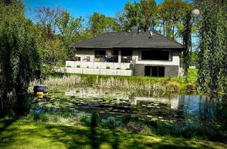 Haus kaufen in 27389 Fintel, Vollsanierter Winkelbungalow als Kleinod auf sonnigem Seerosengrundstück in Fintel zu verkaufen
