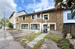 Haus kaufen in 52224 Stolberg, Charmantes Reihenmittelhaus mit angebundener Werkstatt und solidem Zustand in Stolberg-Mausbach!