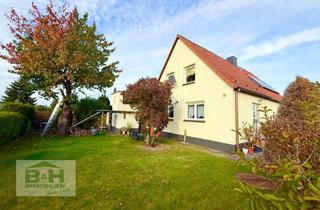 Haus kaufen in 06766 Bitterfeld-Wolfen, Freistehendes Wohnhaus mit Einliegerwohnung, Garten und Doppelgarage bei Bobbau