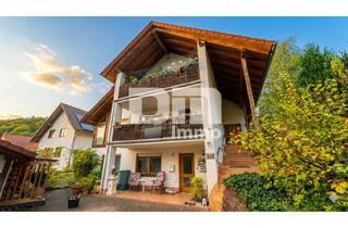 Einfamilienhaus kaufen in 34355 Staufenberg, Einfamilienhaus mit Einliegerwohnung in Traumlage mit Terrasse, Naturgarten und Garage