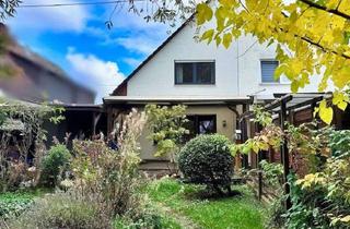 Einfamilienhaus kaufen in 56220 Urmitz, Einfamilienhaus in beliebter Wohnlage von Urmitz/Rhein!