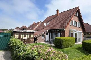 Haus kaufen in 26434 Wangerland, Gemütliches Ferienhaus mit Kamin, moderner Gasheizung, Hohlraumdämmung und Glasfaseranschluss!