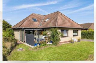 Haus kaufen in 26817 Rhauderfehn, Familienfreundlicher Bungalow mit Wintergarten, Kamin und großem Garten !