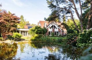 Haus kaufen in 27367 Ahausen, Design trifft Natur: Architektenhaus mit Indoor-Pool, malerischem Garten und idyllischem Teich