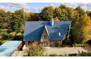 Haus kaufen in 25866 Mildstedt, Großzügiges Architektenhaus mit Einliegerwohnung, Souterrain & parkähnlichem Grundstück in Mildstedt