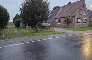 Einfamilienhaus kaufen in 26842 Ostrhauderfehn, Ostrhauderfehn - Sanierbedürftiges Einfamilienhaus in Kanallage