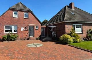 Haus kaufen in 26529 Upgant-Schott, Upgant-Schott - Ein Grundstück zwei Häuser