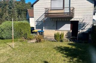 Einfamilienhaus kaufen in 35606 Solms, Solms - Haus mit Garten