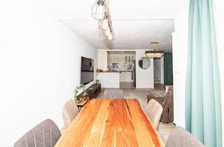 Wohnung kaufen in 63110 Rodgau, Großzügige, familienfreundliche Maisonettewohnung mit Blick in`s Grüne