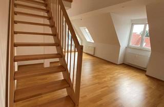 Wohnung kaufen in Bergstraße, 86199 Göggingen, Wunderschöne Dachgeschosswohnung in begehrter Lage