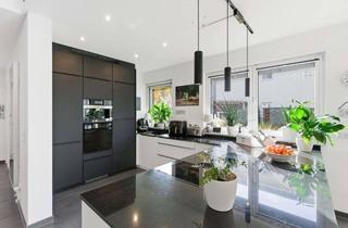 Einfamilienhaus kaufen in 14974 Ludwigsfelde, Architektonische Eleganz trifft auf modernen Wohnkomfort – Ihr exklusives Einfamilienhaus