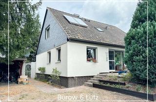 Haus kaufen in 29313 Hambühren, Vielseitiger Bungalow mit großem Grundstück und Vermietungspotenzial in Hambühren