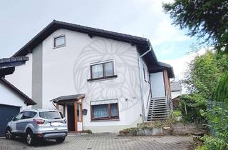 Einfamilienhaus kaufen in 56459 Kaden, Gemeinde Kaden: Freistehendes Einfamilienhaus mit ELW, Garten, Carport und Garagen