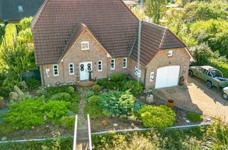 Haus kaufen in 25870 Oldenswort, Tradition trifft Zukunft – Modernes Friesenhaus mit PV-Anlage im Grünen