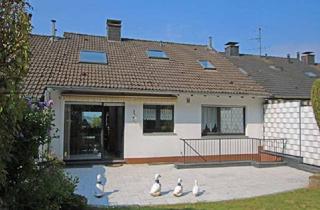 Reihenhaus kaufen in 42111 Wuppertal, Charmantes Reihenhaus mit Einliegerwohnung und Garage in ruhiger Sackgassenlage