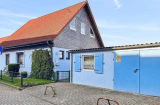 Einfamilienhaus kaufen in 26386 Neuengroden, Komfortables und energetisch saniertes Einfamilienhaus mit Wintergarten und Garage in Neuengroden