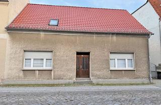 Haus kaufen in 06869 Coswig, Teilsaniertes Reihenendhaus mit viel Potenzial in Coswig (Anhalt)