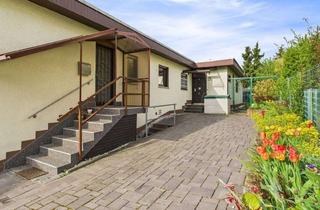 Einfamilienhaus kaufen in 61250 Usingen, Usingen: Einfamilienhaus mit vermietetem Anbau!