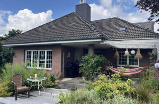 Einfamilienhaus kaufen in 23626 Ratekau, Charmantes Einfamilienhaus mit Keller, Einliegerwohnung, Teich und Doppelgarage