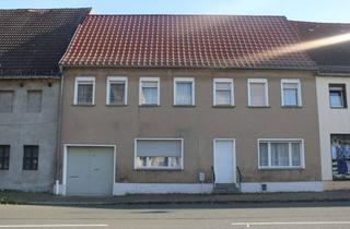 Reihenhaus kaufen in 04880 Dommitzsch, Sanierungsbedürftiges Stadtmittelreihenhaus in Dommitzsch mit Platz für 2 Generationen