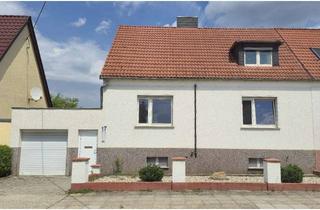 Haus kaufen in Feuerbachstraße 17, 06847 Kochstedt, Solides Familienhaus mit großem Garten und Sanierungsbedarf