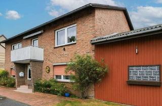 Haus kaufen in 29399 Wahrenholz, Zweifamilienhaus mit effizienter Nahwärme und flexiblem Wohnkonzept in Wahrenholz