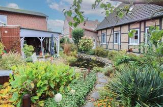 Haus kaufen in 29399 Wahrenholz, Zweifamilienhaus mit effizienter Nahwärme und flexiblem Wohnkonzept in Wahrenholz