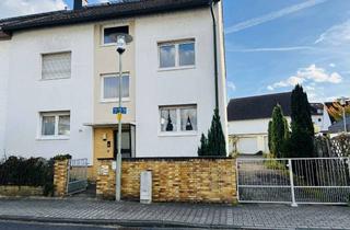 Mehrfamilienhaus kaufen in 63165 Mühlheim, Geräumiges Mehrfamilienhaus mit großem Hofbereich und 4 Garagen