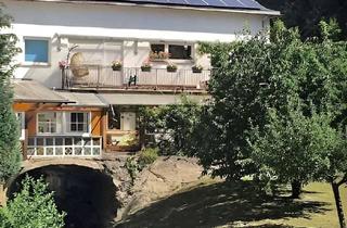 Haus kaufen in 56841 Traben-Trarbach, Charmantes MFH mit Einliegerwohnung, Wintergarten & PV-Anlage in ruhiger Lage von Traben-Trarbach