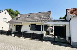 Einfamilienhaus kaufen in 68647 Biblis, Attraktives Einfamilienhaus in ruhiger Lage mit hochwertiger Ausstattung