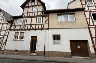 Haus kaufen in 37269 Eschwege, Einfamilien-Fachwerkreihenmittelhaus mit Freisitz, Balkon und Garage in der Altstadt von Eschwege