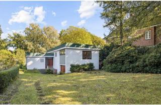 Einfamilienhaus kaufen in 22453 Hamburg, Bungalow mit mid-century Charme am Eppendorfer Moor