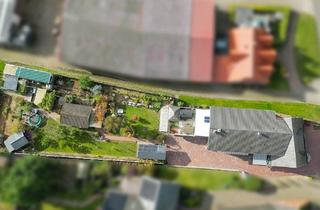 Mehrfamilienhaus kaufen in 26169 Friesoythe, Drei Wohneinheiten auf großem Grundstück mit kleinem Weingut in Neuvrees