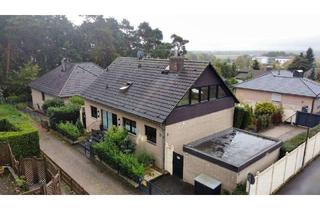 Haus kaufen in 30823 Garbsen, Garbsen - Familienfreundliches Ein-Zweifamilienhaus mit viel Platz in Garbsen