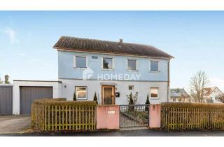 Einfamilienhaus kaufen in 97332 Volkach, Volkach - Familienfreundliches Einfamilienhaus mit 7 Zimmern und zwei Garagen in Gaibach