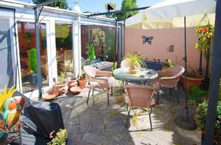 Haus kaufen in 75328 Schömberg, Schömberg - Charmanter Bungalow mit Wintergarten und idyllischem Garten - Wohnen im Kurort Schömberg