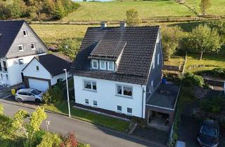 Einfamilienhaus kaufen in 57334 Bad Laasphe, Bad Laasphe - Gepflegtes Wohnhaus mit Doppelgarage in Bad Laasphe-Feudingen