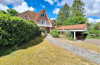 Wohnung kaufen in 23627 Groß Grönau, Eindrucksvolle Maisonette-Wohnung mit 4 Balkonen, Doppelcarport, Sauna und Haus-im-Haus-Charakter!