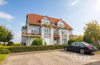 Wohnung kaufen in 15306 Seelow, Investieren mit Aussicht – Vermietete 4-Zimmer Maisonettewohnung mit Garage