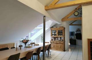 Wohnung kaufen in 76744 Wörth, Traumhafte Dachgeschosswohnung mit Deckenhöhen von über drei Metern