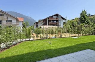 Wohnung kaufen in 82467 Garmisch-Partenkirchen, Hochwertige Eigentumswohnung mit Gartenanteil im Erdgeschoss C01