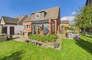 Einfamilienhaus kaufen in 31275 Lehrte, Charmantes Einfamilienhaus mit Wintergarten und großem Garten