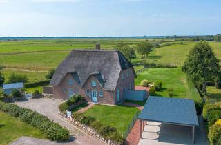 Doppelhaushälfte kaufen in 25881 Tating, Exklusives Wohnen vor SPO Doppelhaushälfte mit Kamin und Doppelcarport