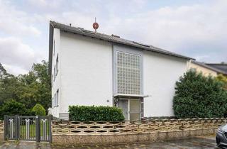 Mehrfamilienhaus kaufen in 65428 Rüsselsheim, Sofort bezugsfrei: Attraktives Mehrfamilienhaus mit Garten in Königstädten