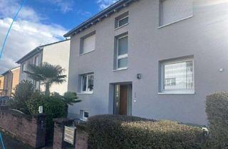 Haus kaufen in 65474 Bischofsheim, Modernes Wohnen im Zweifamilienhaus Komfort & Gemeinschaft vereint