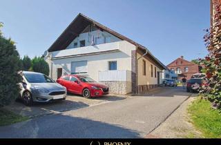 Haus kaufen in 32609 Hüllhorst, Attraktive Kapitalanlage: Voll vermietetes 4-Familienhaus in Hüllhorst mit ca. 7,7 % Rendite